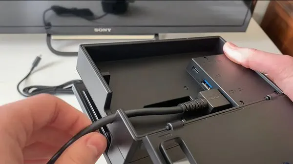 Connect the one end of the HDMI cable to the HDMI Out slot of the dock